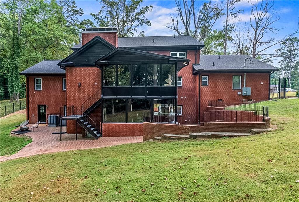 3519 Prince George Street Atlanta, GA 30344 - Photo 51 of 58 a front view of a house with a yard