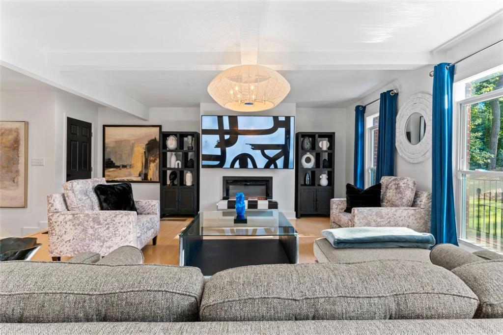 3519 Prince George Street Atlanta, GA 30344 - Photo 7 of 58 a living room with furniture and a fireplace