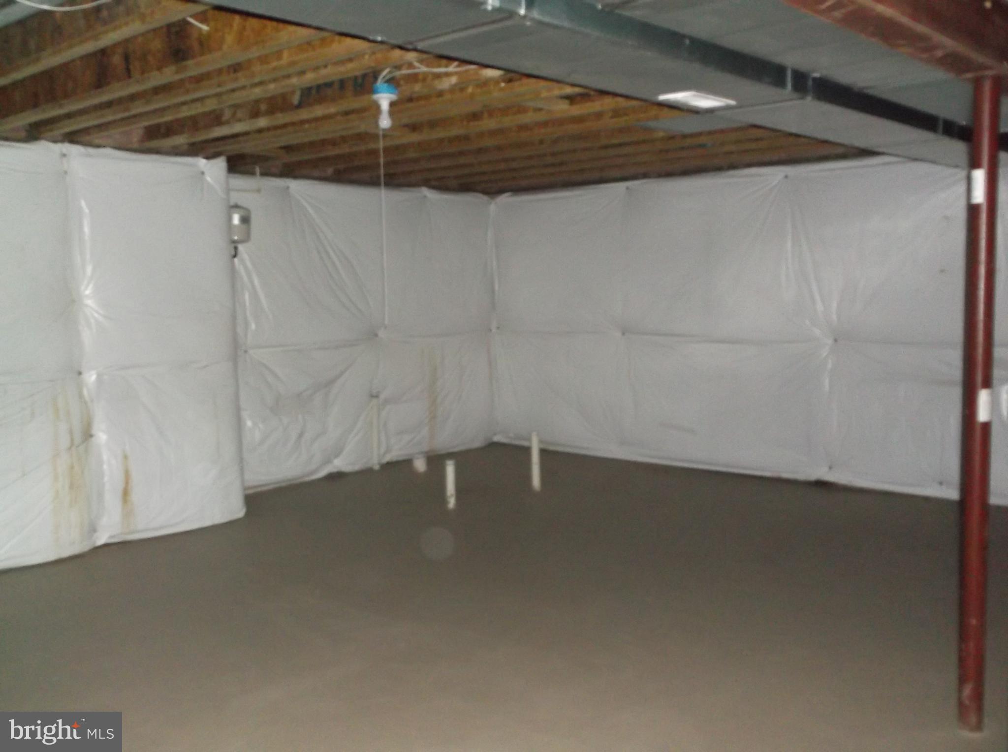 11147 Rawhide Road Lusby, MD 20657 - Photo 21 of 30 a view of a room with an empty space
