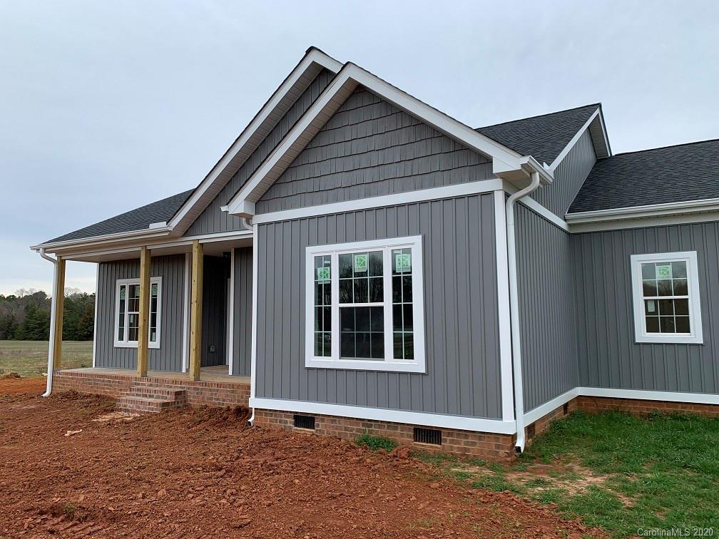 545 Gatton Road Cleveland, NC 27013 - Photo 3 of 27 a front view of a house with a yard