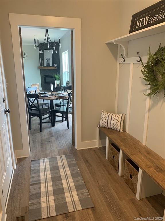 545 Gatton Road Cleveland, NC 27013 - Photo 26 of 27 a view of a dining room with furniture and wooden floor