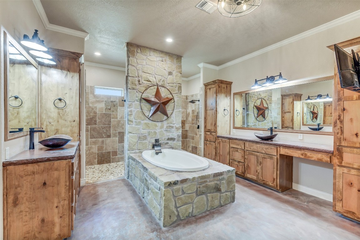 41545 Farm To Market 3346 Hempstead, TX 77445 - Photo 12 of 49 a spacious bathroom with a double vanity sink mirror and shower