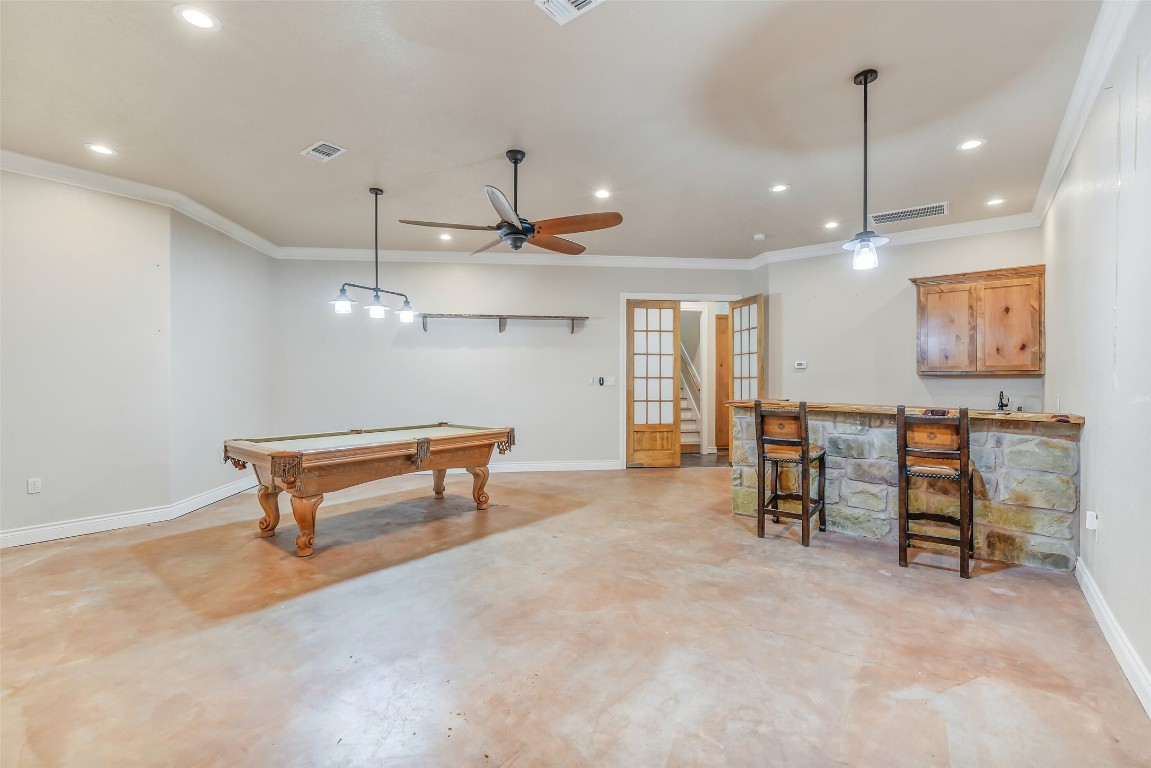 41545 Farm To Market 3346 Hempstead, TX 77445 - Photo 22 of 49 a view of a room with shelves and wooden floor