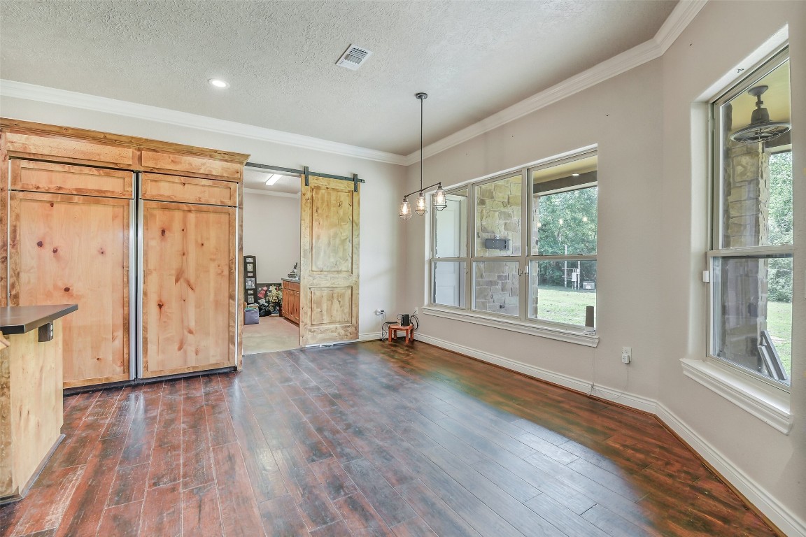 41545 Farm To Market 3346 Hempstead, TX 77445 - Photo 33 of 49 an empty room with wooden floor and windows