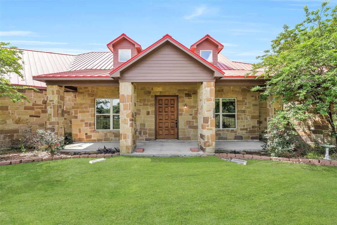 41545 Farm To Market 3346 Hempstead, TX 77445 - Photo 4 of 49 front view of a house with a yard