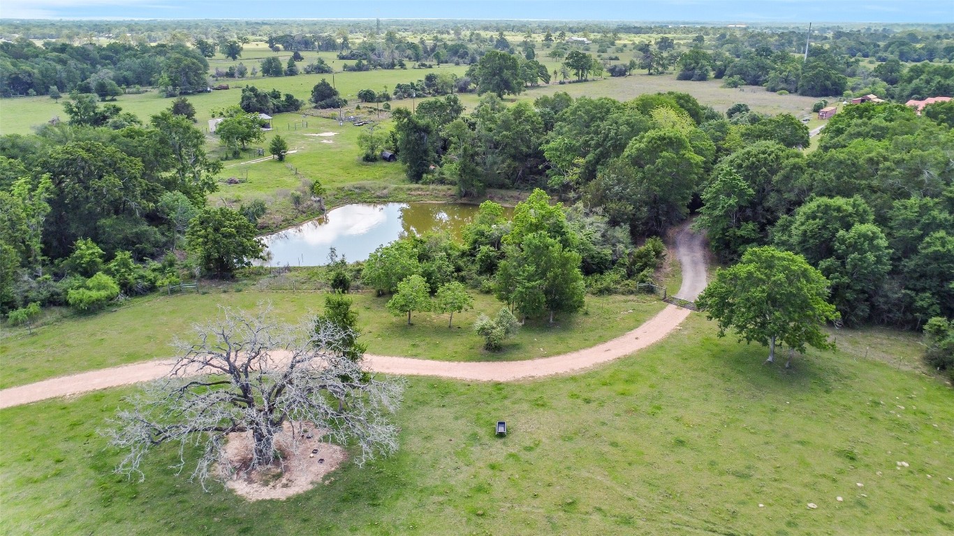41545 Farm To Market 3346 Hempstead, TX 77445 - Photo 49 of 49 an aerial view of a house with a yard
