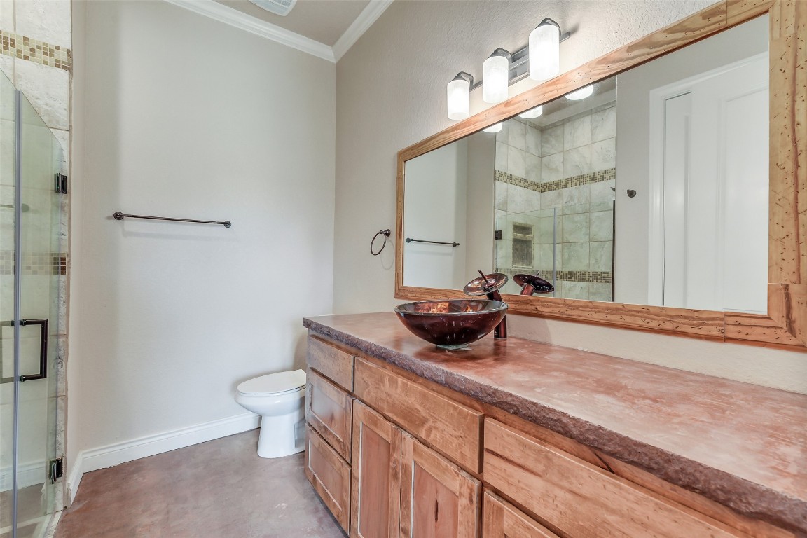 41545 Farm To Market 3346 Hempstead, TX 77445 - Photo 9 of 49 a bathroom with a granite countertop sink a toilet and a mirror