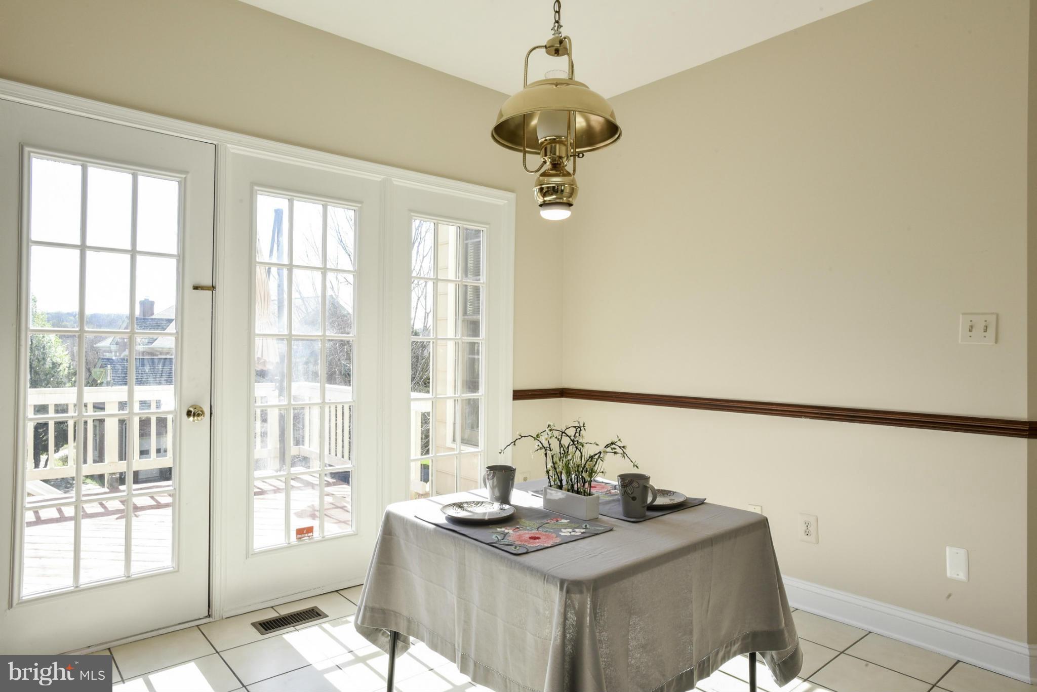 9723 Middleton Ridge Road Vienna, VA 22182 - Photo 12 of 30 Breakfast Room with French door to deck
