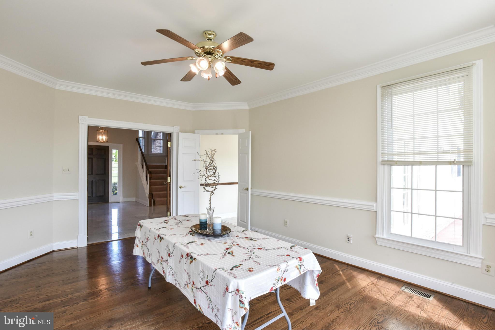 9723 Middleton Ridge Road Vienna, VA 22182 - Photo 6 of 30 Dining Room with rich hardwood floors.