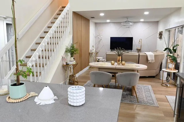 a balcony with a table and a couch