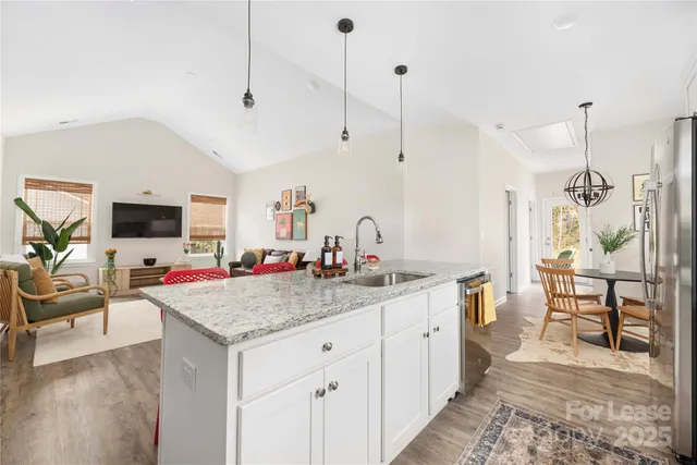 a view of living room and kitchen