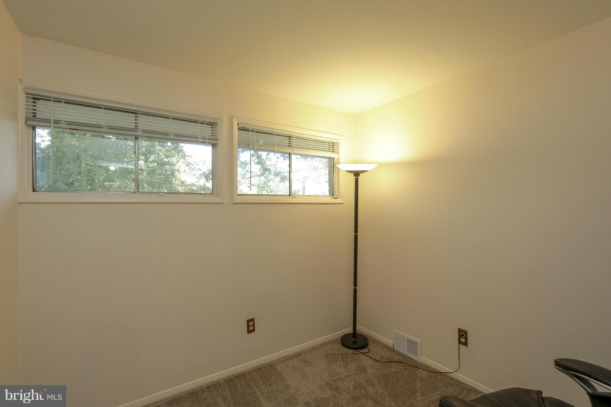 7207 Highland Street Springfield, VA 22150 - Photo 14 of 26 a view of a room that has a window in it