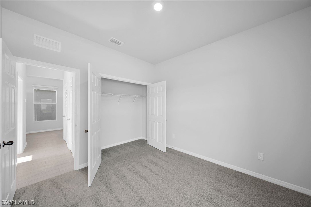 900 Friendship Circle LaBelle, FL 33935 - Photo 15 of 21 wooden floor in a room