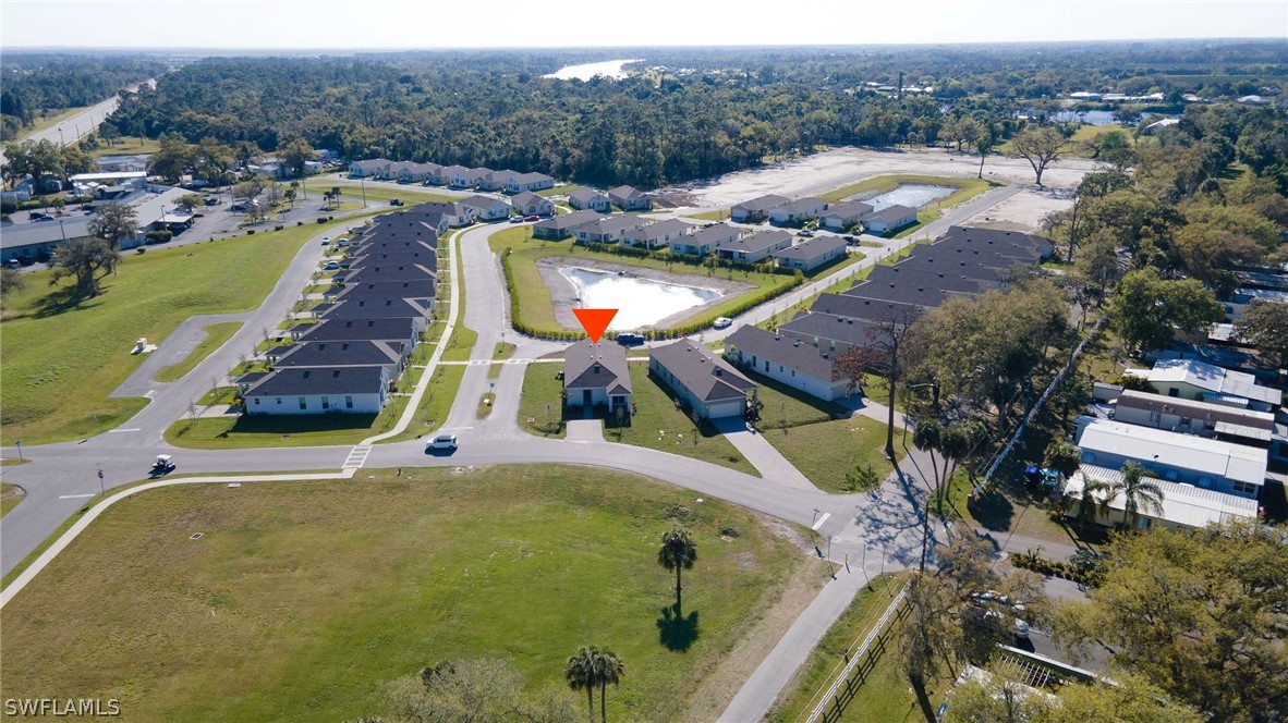 900 Friendship Circle LaBelle, FL 33935 - Photo 21 of 21 a view of a house with a swimming pool