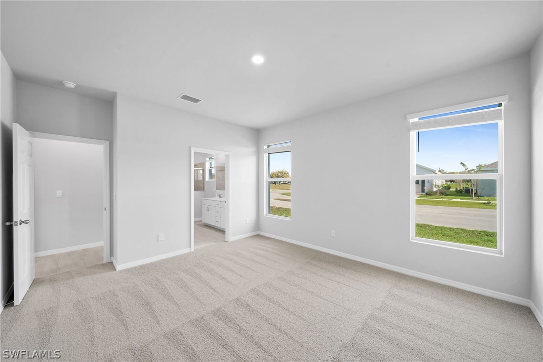 900 Friendship Circle LaBelle, FL 33935 - Photo 8 of 21 a view of an empty room with a window
