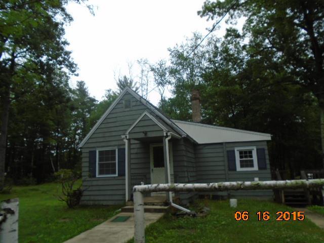 418 Hunter Road Tolland, CT 06084 - Photo 1 of 1 a front view of a house with garden