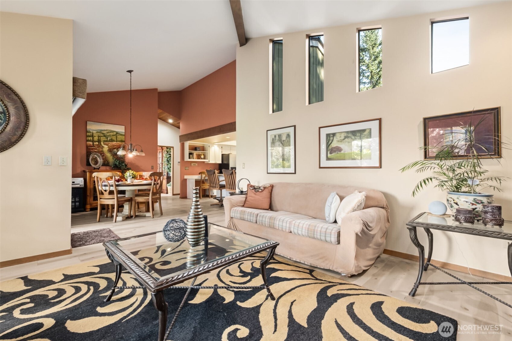 22505 241st Avenue Southeast Maple Valley, WA 98038 - Photo 16 of 30 a living room with furniture and wooden floor