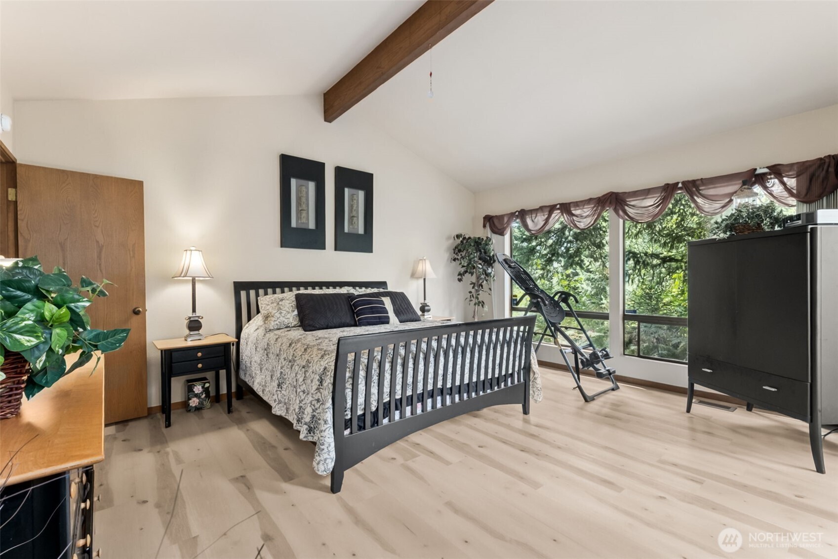 22505 241st Avenue Southeast Maple Valley, WA 98038 - Photo 19 of 30 a bedroom with a bed and a window