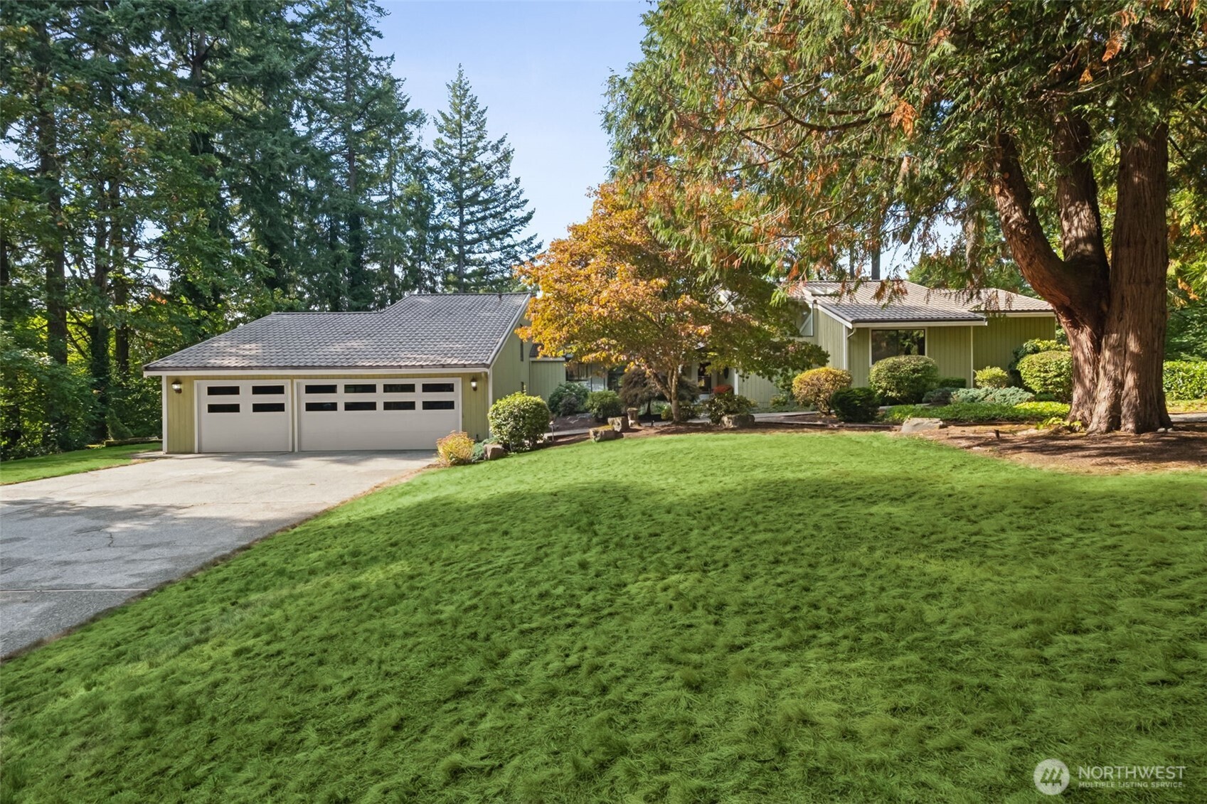 22505 241st Avenue Southeast Maple Valley, WA 98038 - Photo 2 of 30 a view of house with yard