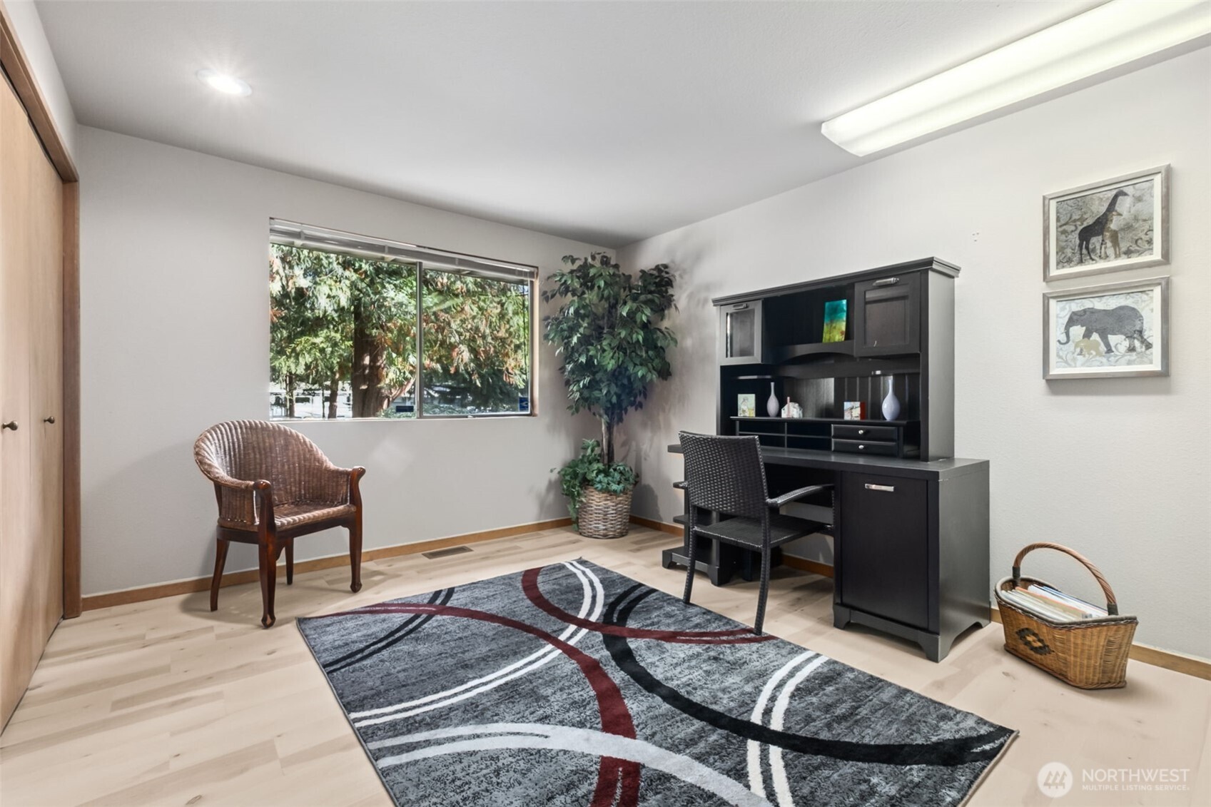 22505 241st Avenue Southeast Maple Valley, WA 98038 - Photo 25 of 30 a living room with furniture a window and a potted plant
