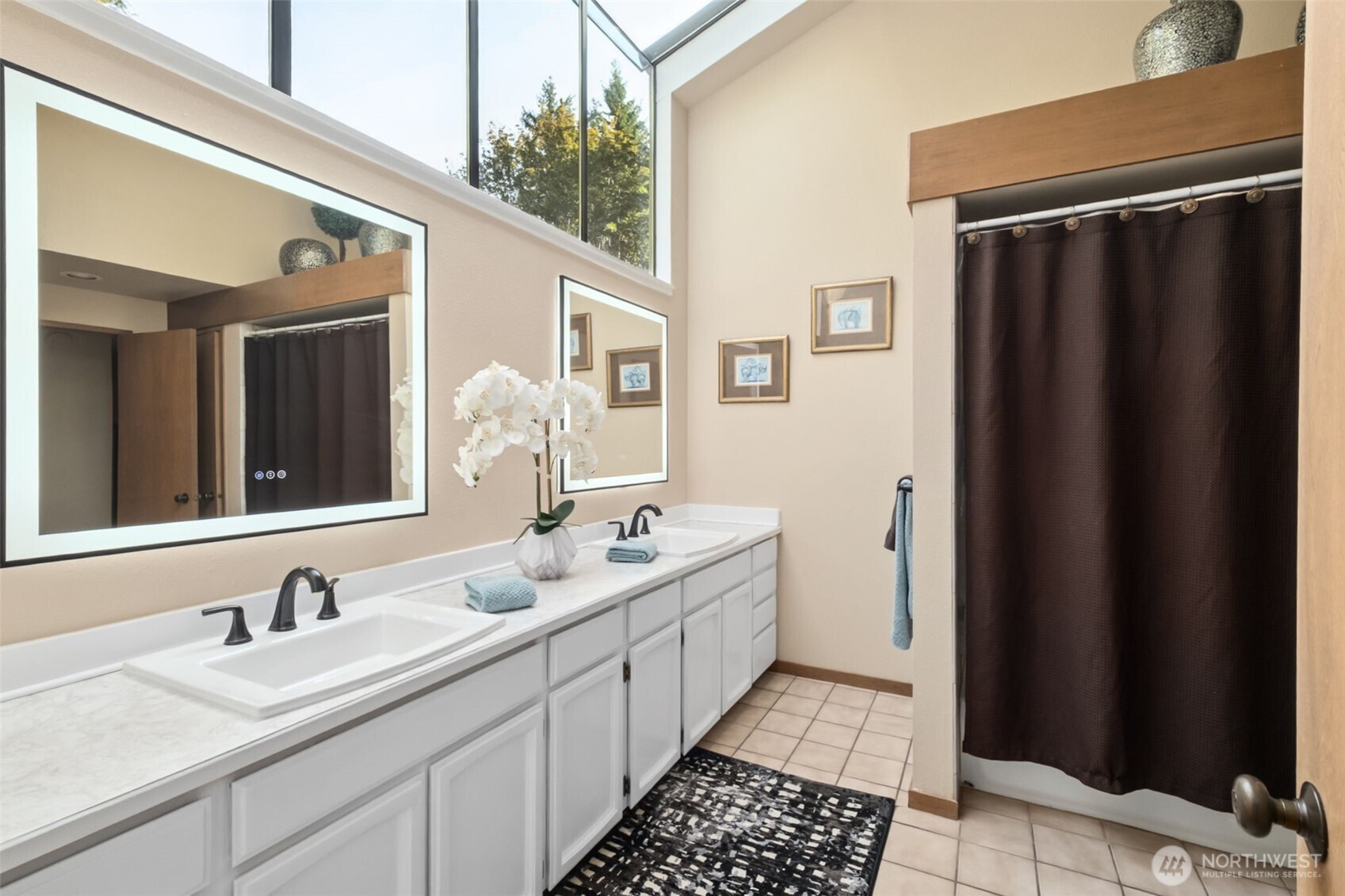 22505 241st Avenue Southeast Maple Valley, WA 98038 - Photo 26 of 30 a bathroom with a double vanity sink and mirror