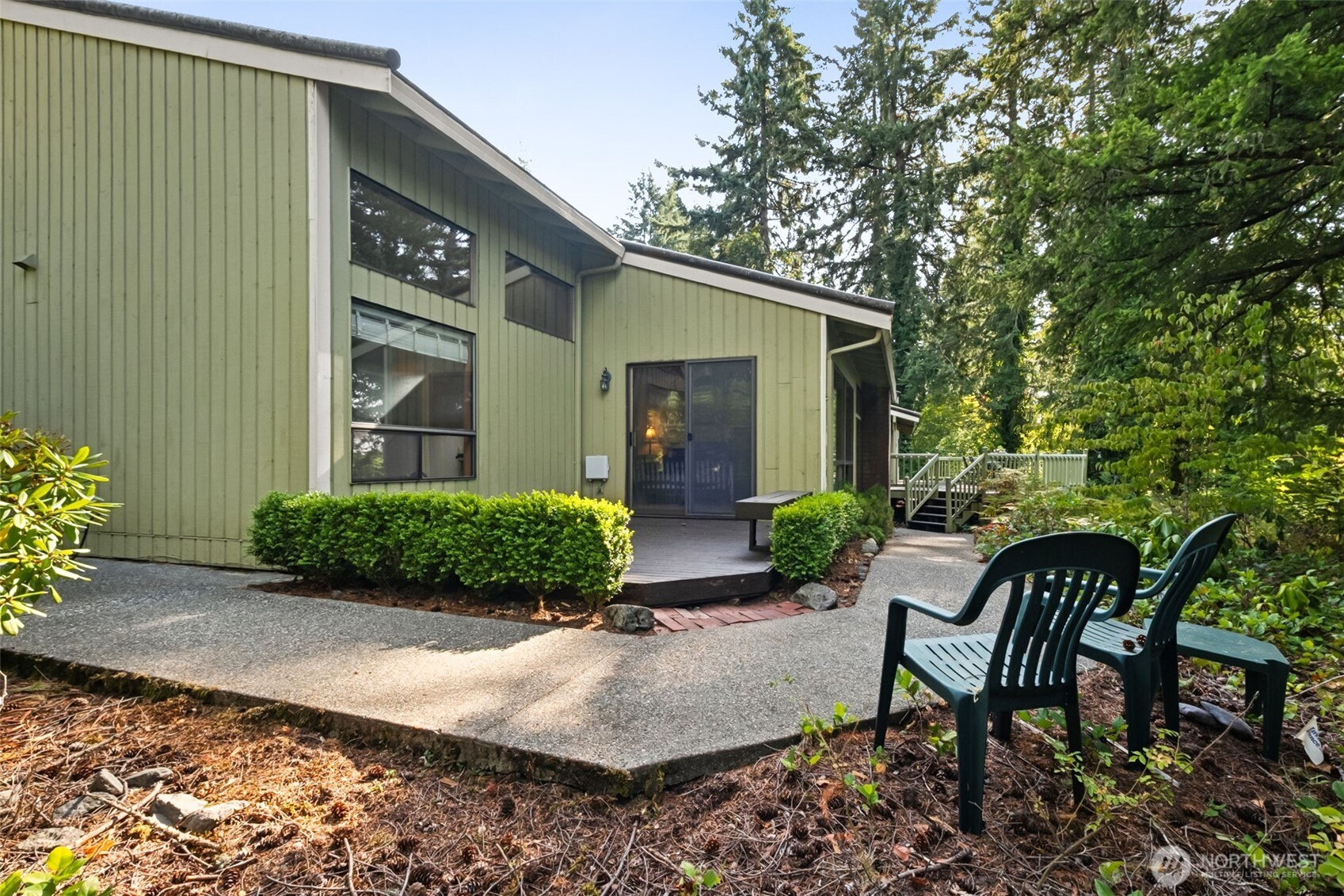 22505 241st Avenue Southeast Maple Valley, WA 98038 - Photo 29 of 30 a view of backyard with outdoor seating and plants