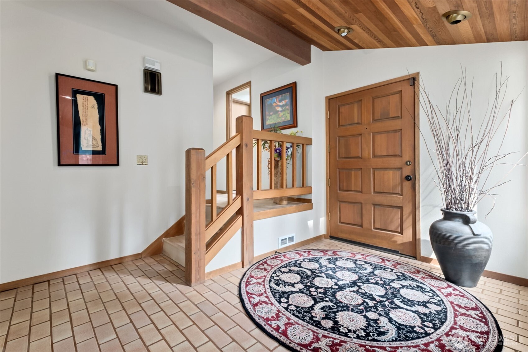 22505 241st Avenue Southeast Maple Valley, WA 98038 - Photo 4 of 30 a view of a livingroom with wooden floor and furniture