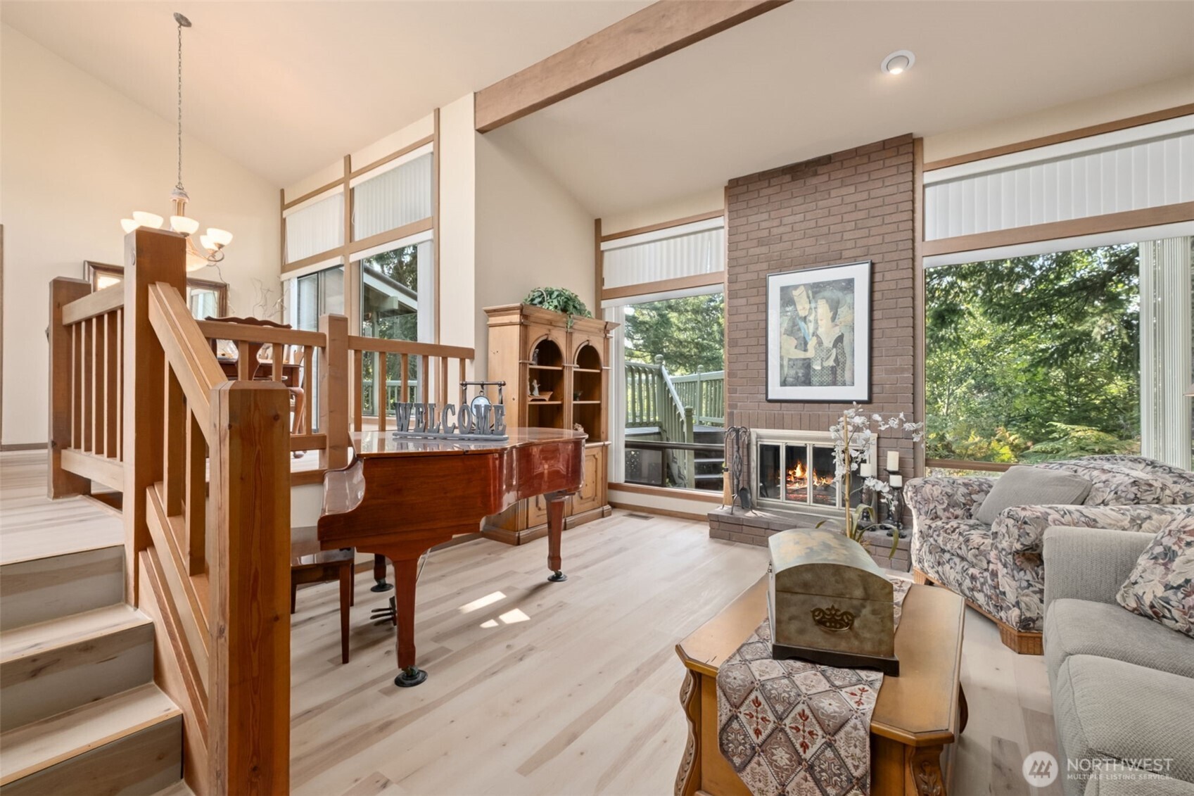 22505 241st Avenue Southeast Maple Valley, WA 98038 - Photo 6 of 30 a living room with furniture and a window