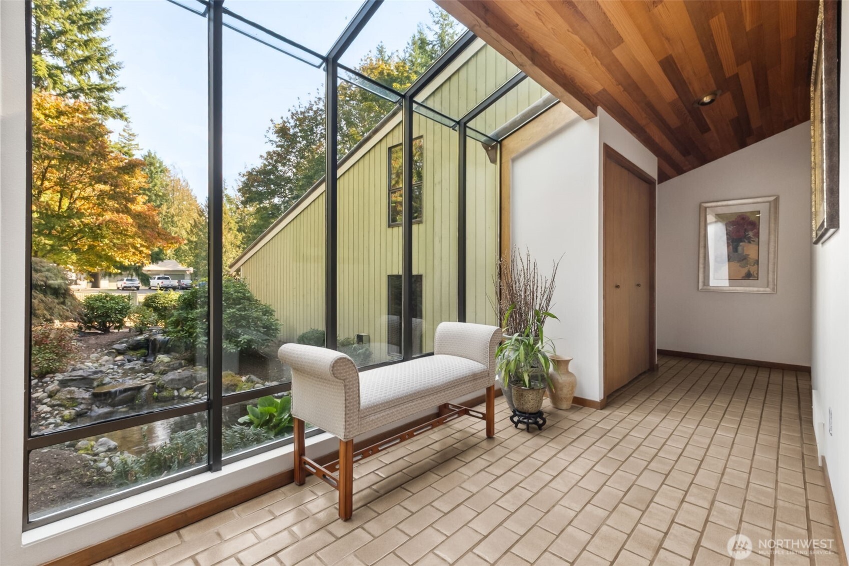 22505 241st Avenue Southeast Maple Valley, WA 98038 - Photo 9 of 30 a balcony with furniture and wooden floor