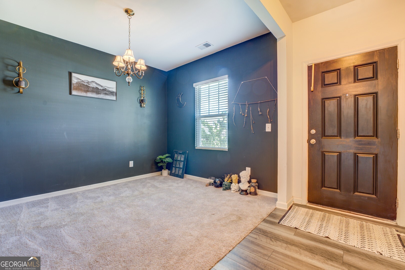 89 Dorsey Way Monroe, GA 30655 - Photo 13 of 26 a bedroom with a bed and window