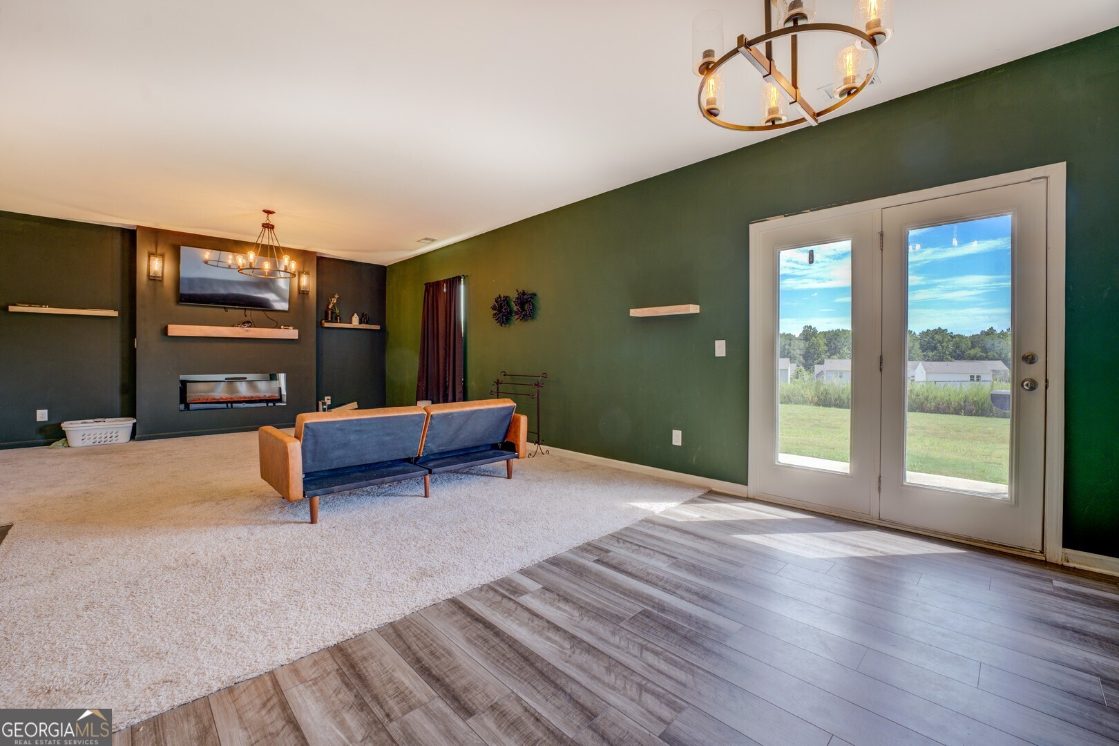 89 Dorsey Way Monroe, GA 30655 - Photo 15 of 26 a bedroom with furniture and window