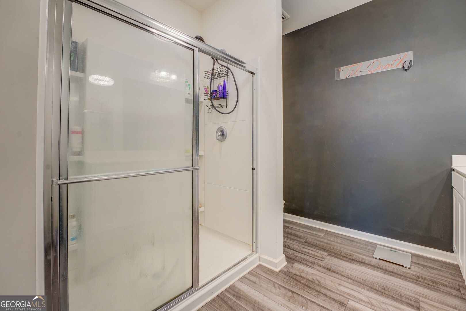 89 Dorsey Way Monroe, GA 30655 - Photo 22 of 26 a view of a hallway with wooden floor