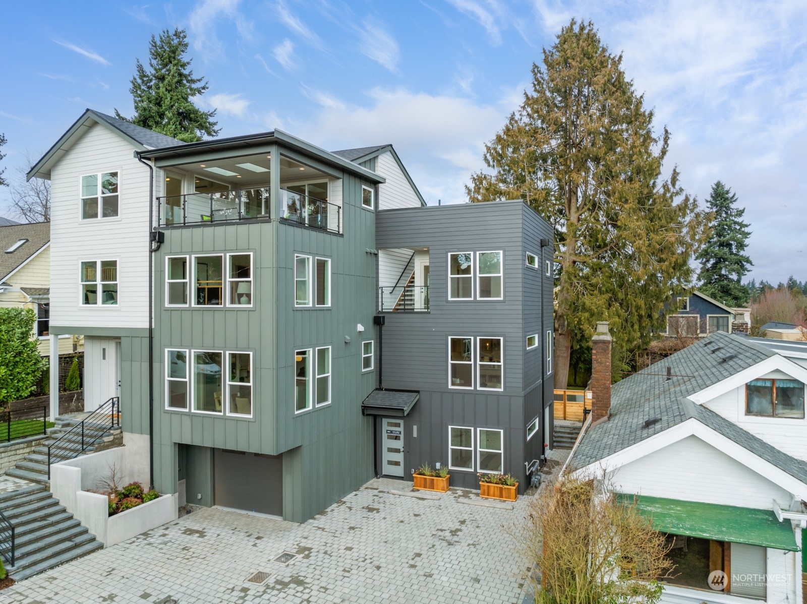 356 North 75th Street, Unit B Seattle, WA 98103 - Photo 1 of 32 a front view of a house with a yard