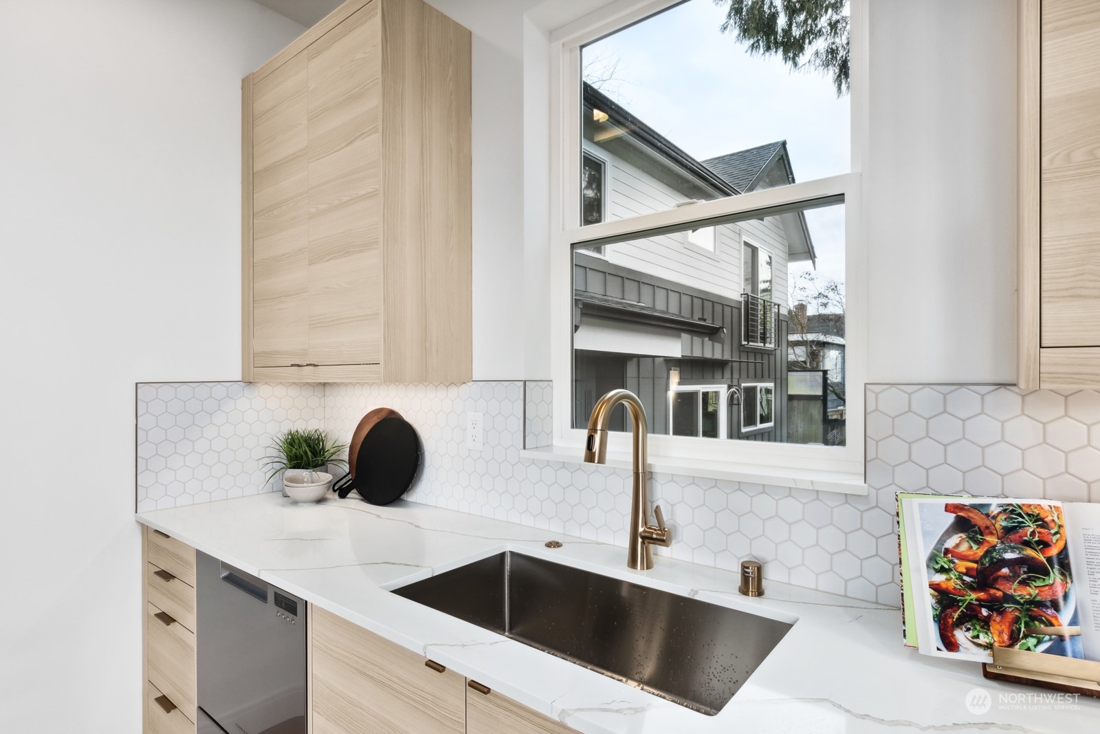 356 North 75th Street, Unit B Seattle, WA 98103 - Photo 10 of 32 a kitchen with a sink and cabinets