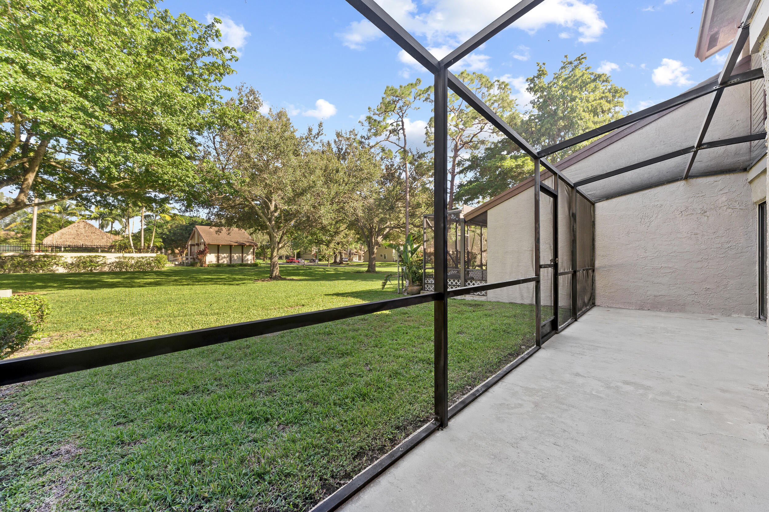 22384 Thousand Pines Lane Boca Raton, FL 33428 - Photo 27 of 45 a view of swimming pool with an outdoor space