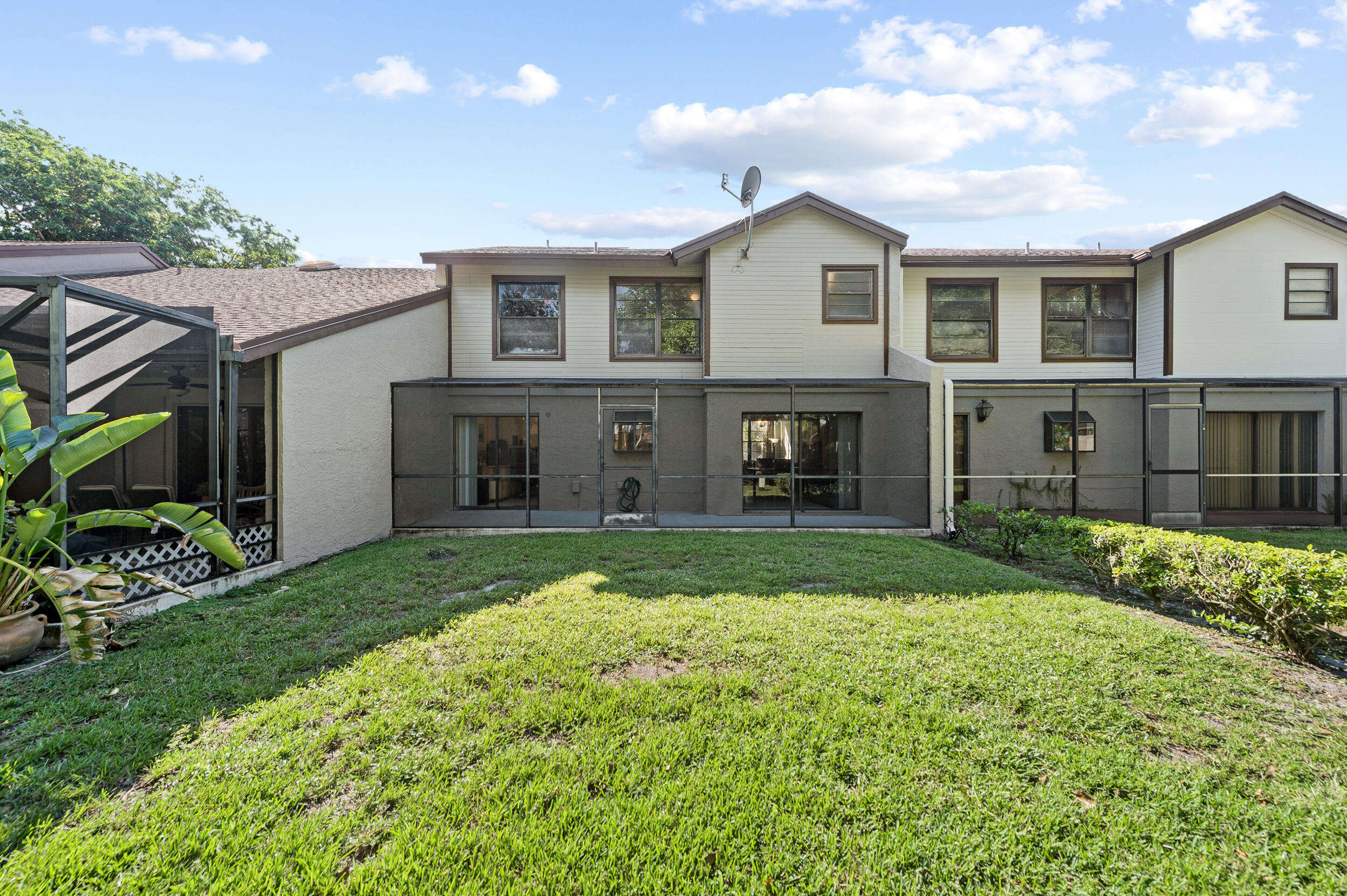 22384 Thousand Pines Lane Boca Raton, FL 33428 - Photo 29 of 45 a view of a yard in front of a house