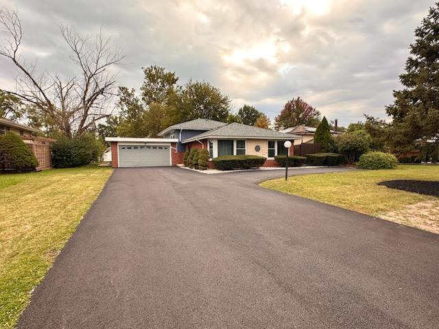 6839 West 127th Street Palos Heights, IL 60463 - Photo 15 of 15 a view of a house with swimming pool and sitting area