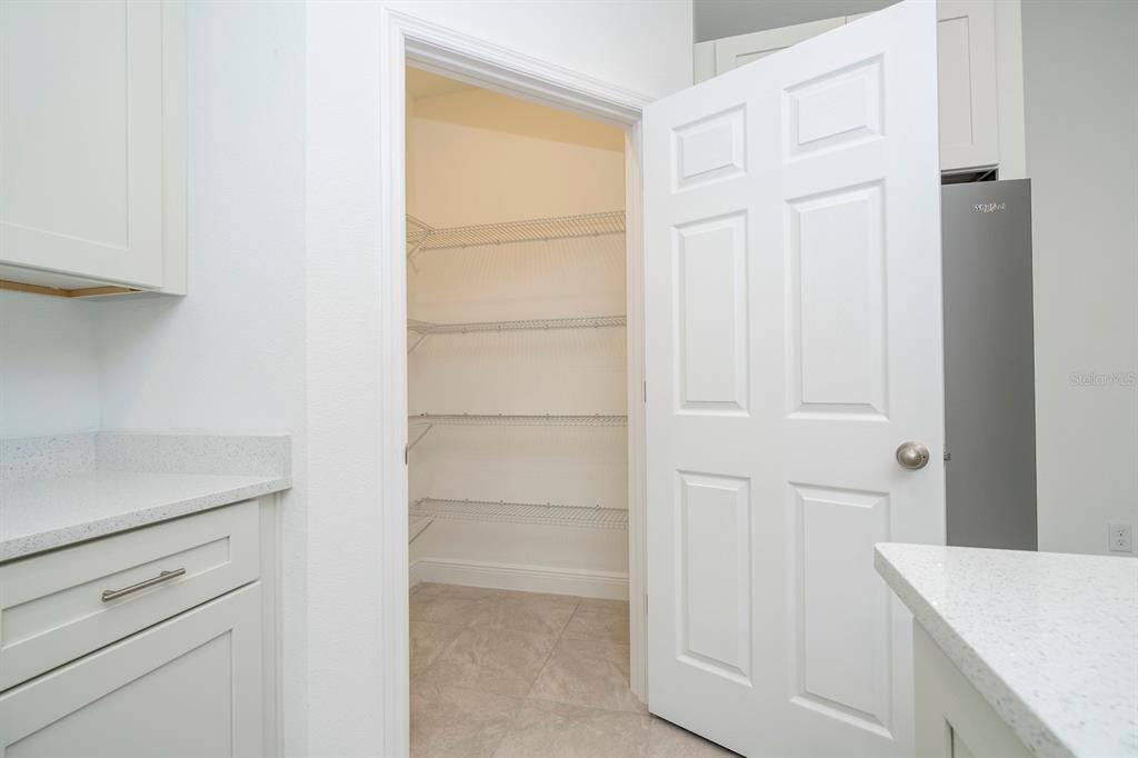 208 Locust Pass Ocala, FL 34472 - Photo 12 of 71 a view of walk in closet with empty racks