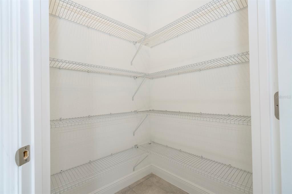 208 Locust Pass Ocala, FL 34472 - Photo 13 of 71 a view of an empty walk in closet