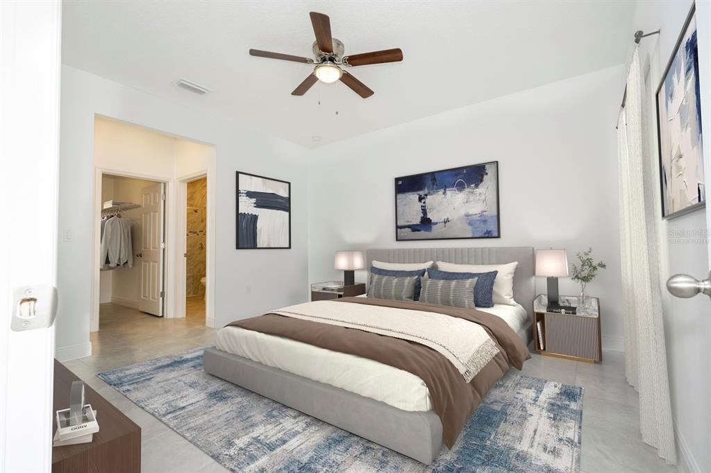 208 Locust Pass Ocala, FL 34472 - Photo 30 of 71 a bedroom with bed and a chandelier