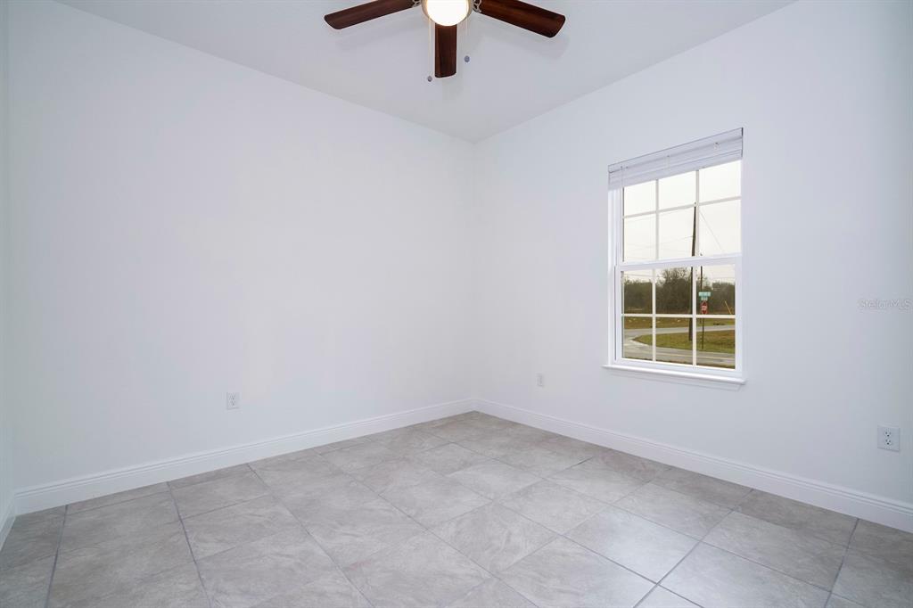 208 Locust Pass Ocala, FL 34472 - Photo 60 of 71 an empty room with a window