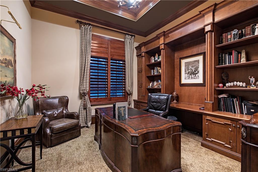 6265 Highcroft Drive Naples, FL 34119 - Photo 17 of 22 a living room with furniture and a window