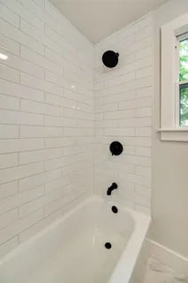 a bathroom with a bathtub