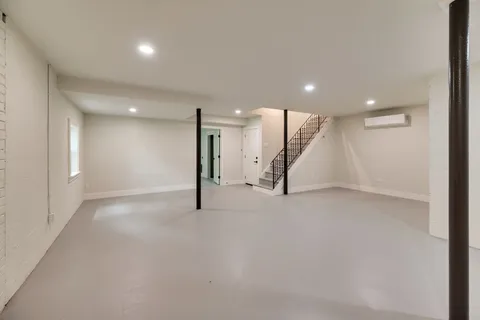 a view of a hall with an entryway