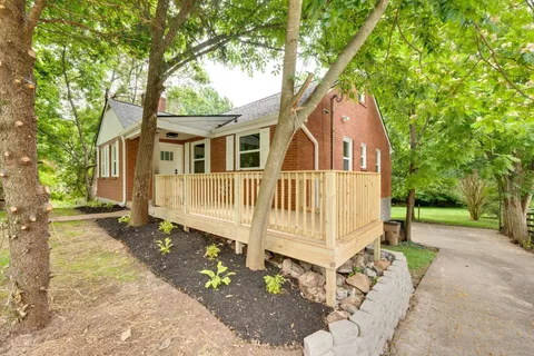front view of a house with a yard