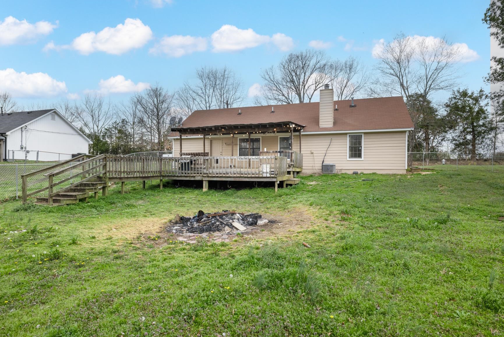 1368 Mathis Road Drummonds, TN 38023 - Photo 28 of 29 a backyard of a house with a garden and barbeque oven