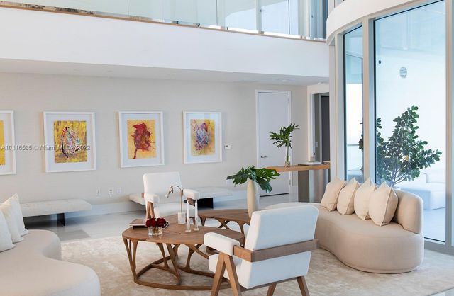 a living room with furniture and a couch