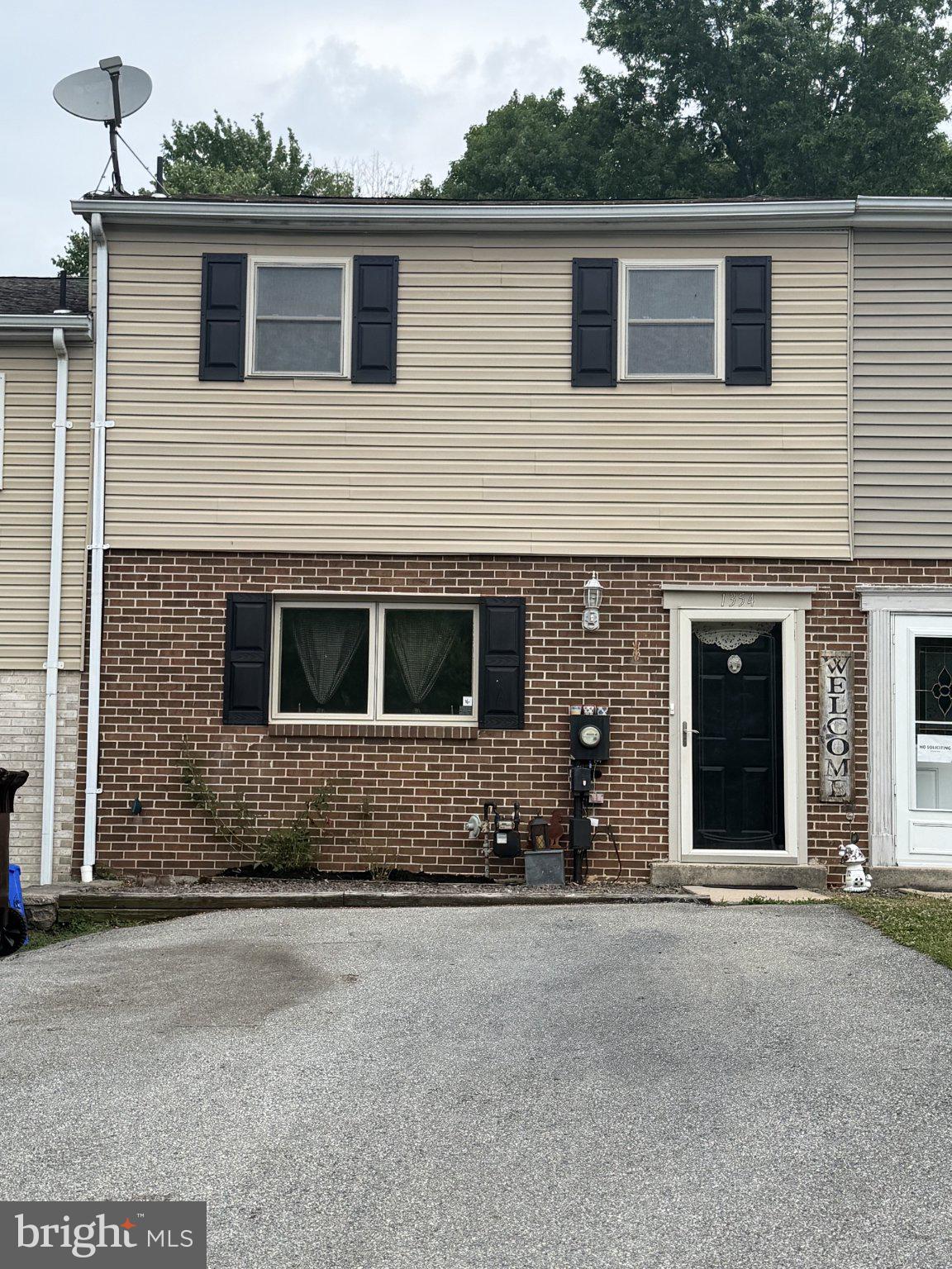 1354 Fox Run Reading, PA 19606 - Photo 1 of 1 Charming brick-front home awaits you.