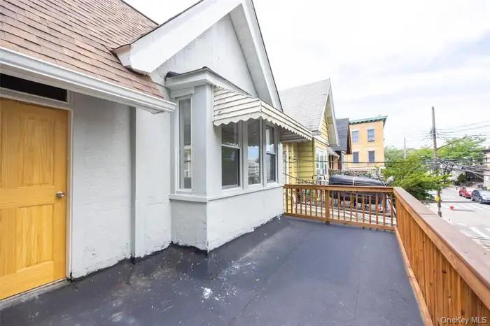 88-08 88th Street Queens, NY 11421 - Photo 31 of 32 a view of balcony with staircase