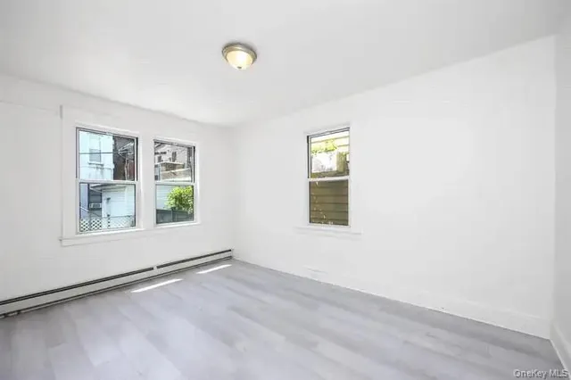 an empty room with windows